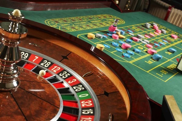 MMA fight odds displayed on home togel mobile app with live casino tables in background