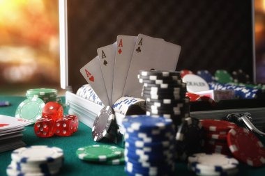 Mobile phone displaying Wild Rift match feed and live casino tables on home togel app